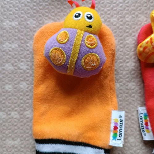 Lamaze rattles used with socks and wristbands