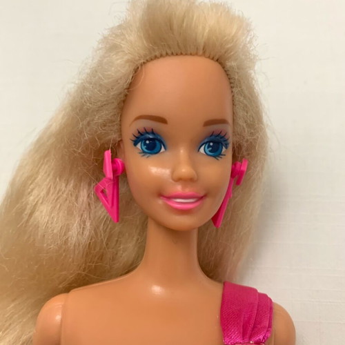 Totally Hair Barbie used with long hair and original earrings