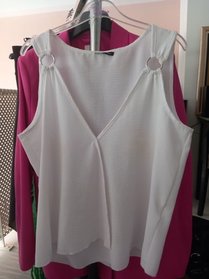 Women's top with decorative ring straps like new, size L