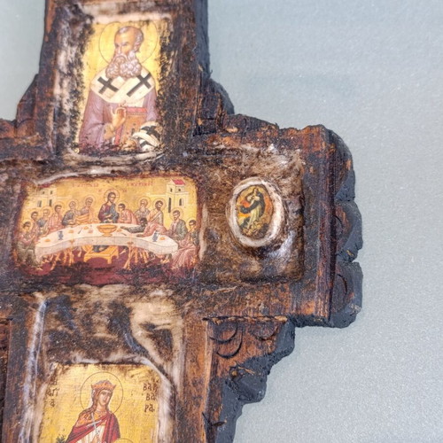 Wooden cross decorated with icons