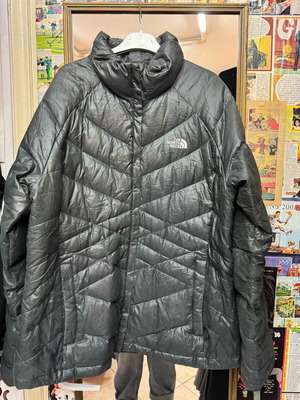 The North Face jacket like new with stitched logo