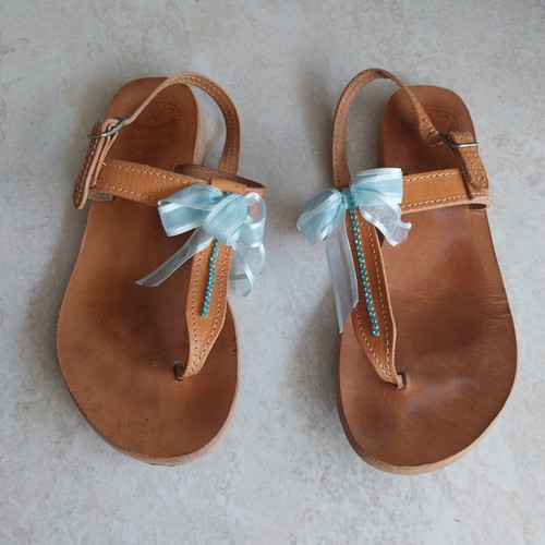 Leather Greek Sandals size 38 used with blue bows