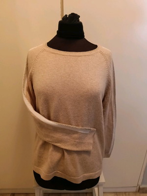 Beige knitted blouse used with white trim and gold thread, size L