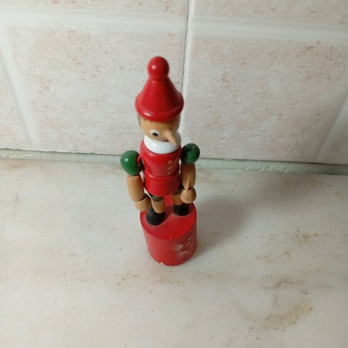 Wooden Pinocchio finger puppet used, classic decorative toy