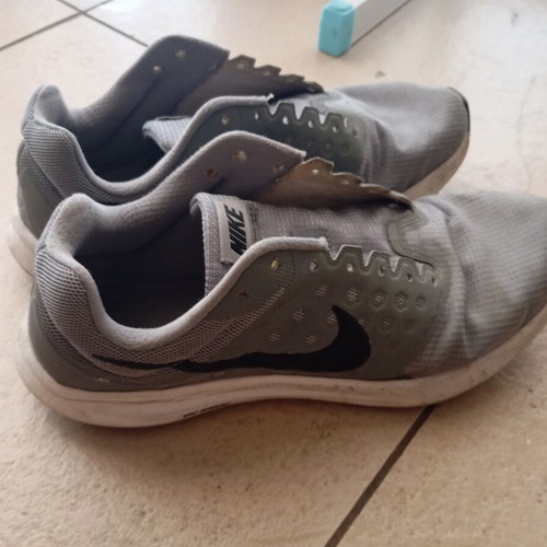 Nike men's athletic shoes, grey, size 43, missing laces