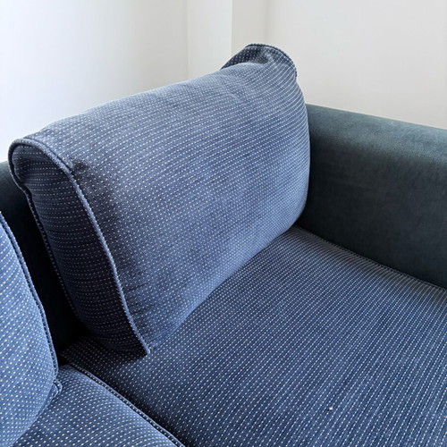 Two dark blue used two-seater sofas set