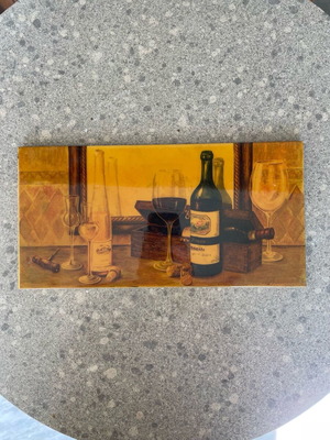 Ceramic tile with wine design