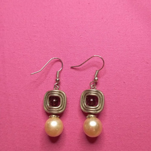 Silver earrings with red stone used