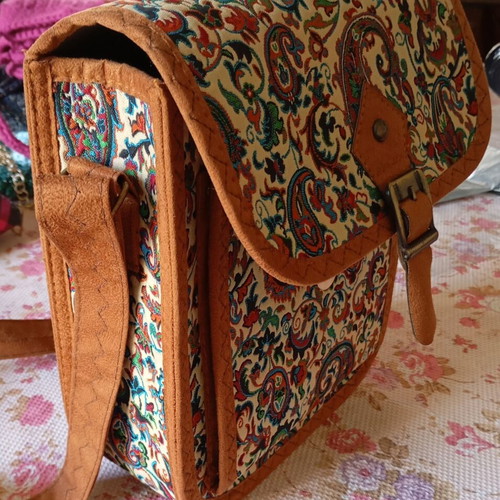 Women's crossbody bag with suede strap, brown and multicolor pattern