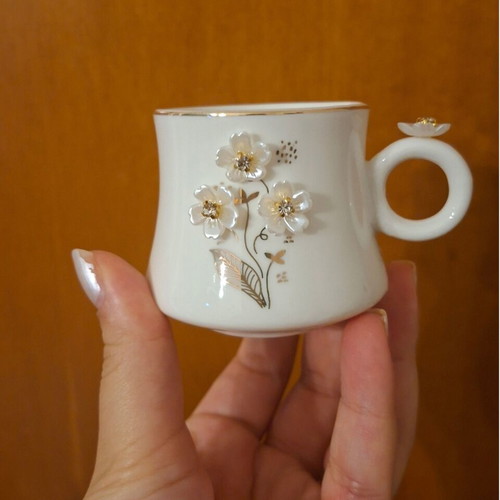 White Porcelain Espresso Cup with Decorative Stones and Saucer, very good condition