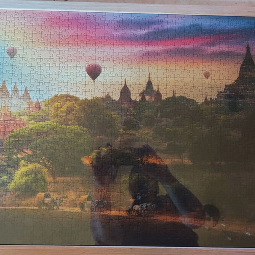 Framed puzzle like new, dimensions 0.53x0.73 m