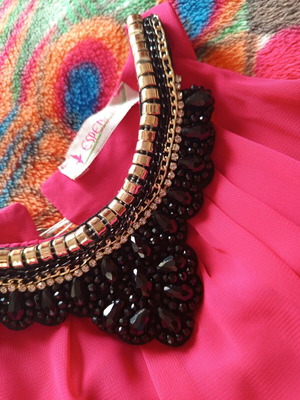 Fuchsia dress size M like new with jewelry detail