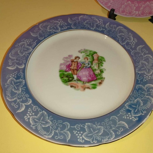 Decorative porcelain plates used from Japan with small chip