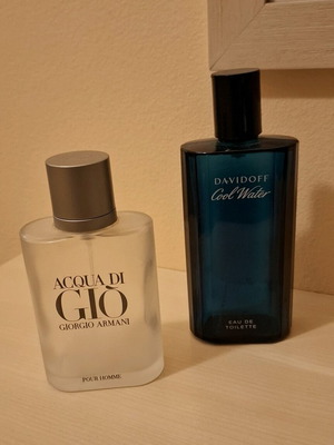 Two empty men's perfume bottles used Davidoff Coolwater and Giorgio Armani Acqua di Gio