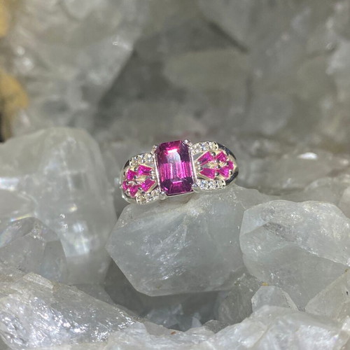 Silver ring with natural rhodolite garnet and moissanite