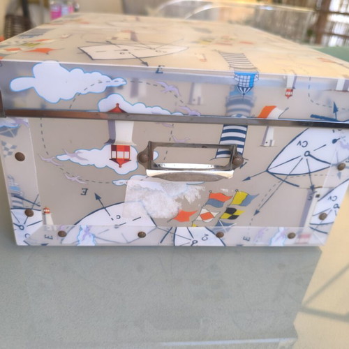 Decorative storage box used with nautical theme, lighthouses and flags