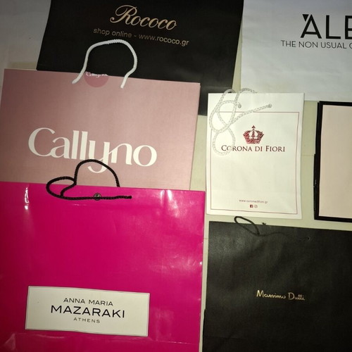 Paper branded bags used, pack of 11 pieces