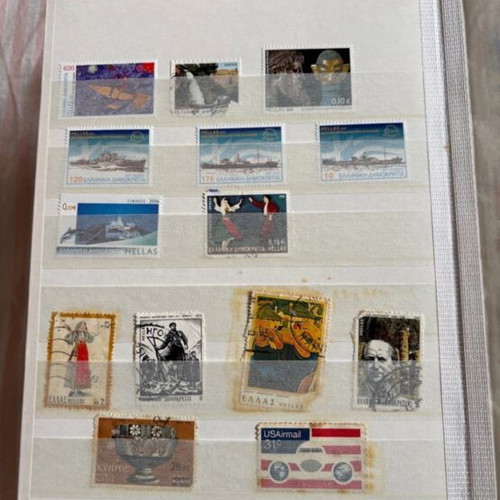 Stamp album like new, including Athens 2004 Olympic Games series