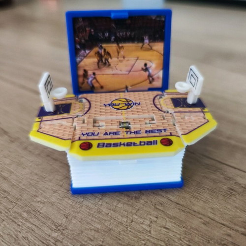 3D book keychain like new that turns into a basketball court blue