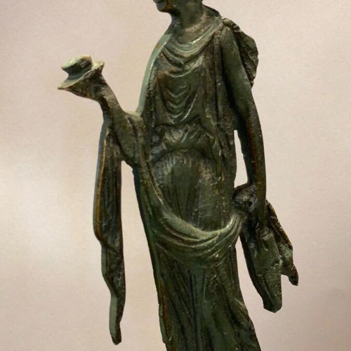 Decorative figurine of archaic/classical type used, bronze metal
