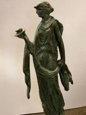 Decorative figurine of archaic/classical type used, bronze metal