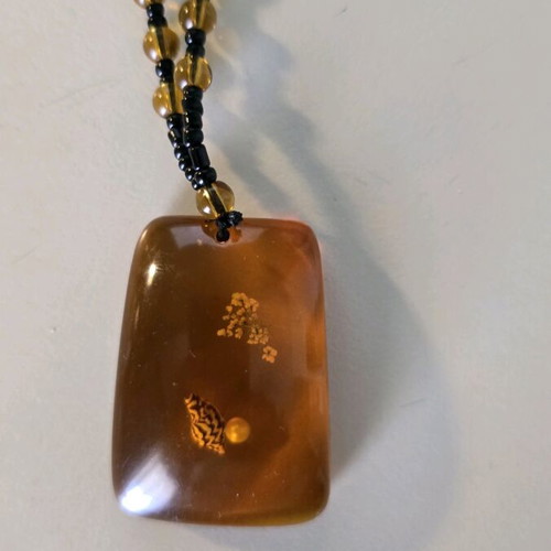 Pendant necklace with resin shells like new