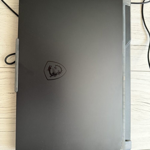 MSI Cyborg 15 A13V laptop like new with mouse and headphones