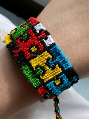 Handmade macrame bracelet with puzzle design made to order