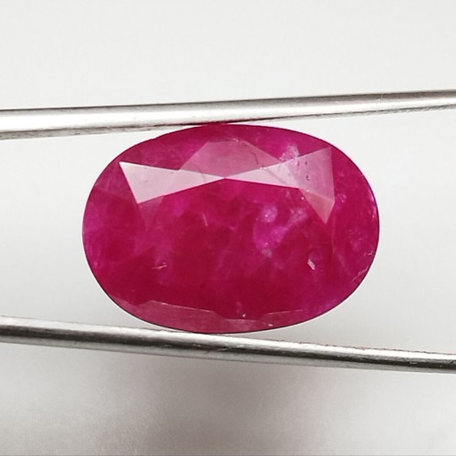 Ruby 10.54 carat hot pinkish red from Mozambique new