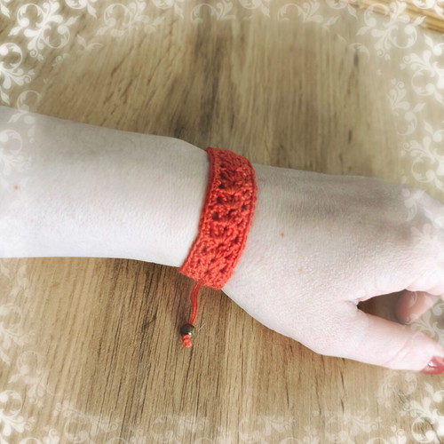 Knitted bracelet new red with beads made of cotton thread