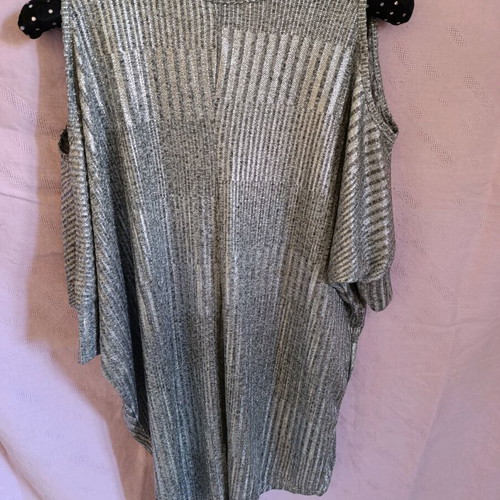 Women's blouse like new, silver shiny fabric, shoulder cutouts, sizes S and M