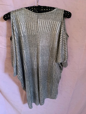 Women's blouse like new, silver shiny fabric, shoulder cutouts, sizes S and M