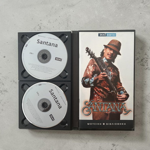 Santana book with 2 CDs like new
