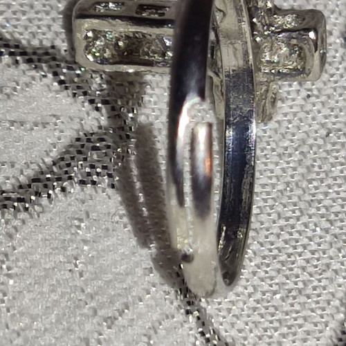 Cross ring like new, silver color, not silver material