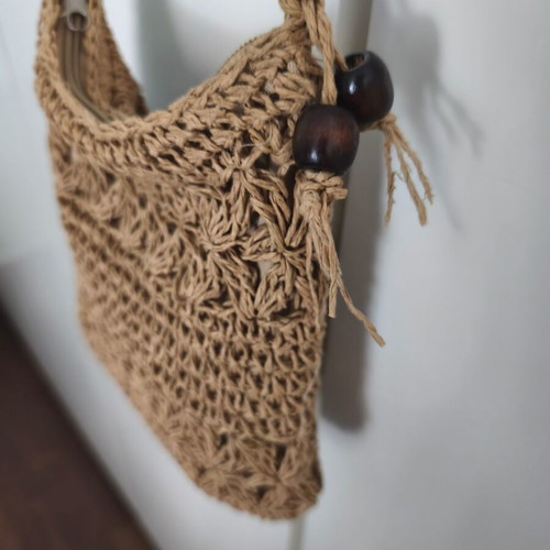 Woven straw bag like new with decorative beads crossbody