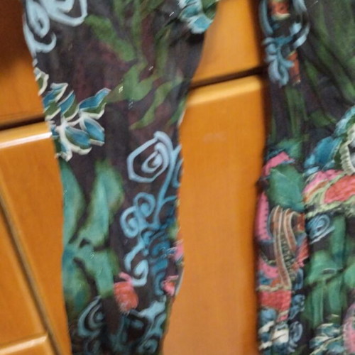 Blouse used, colorful transparent with crossover neckline and lace pattern, size L