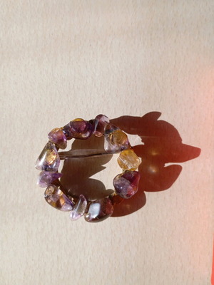 Vintage pin used with purple stones