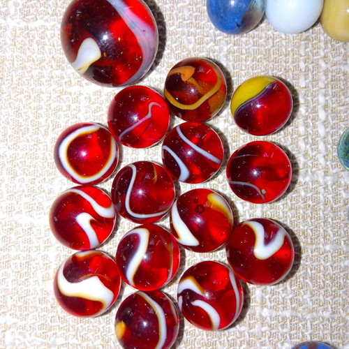 Set of 68 glass marbles used with collectible designs and 2 large shooters