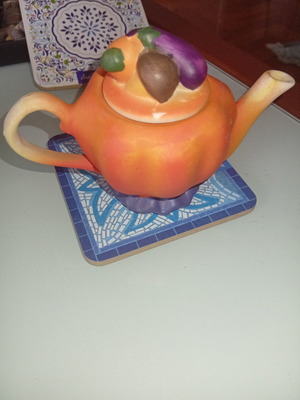 Vintage ceramic miniature teapot figure with lid