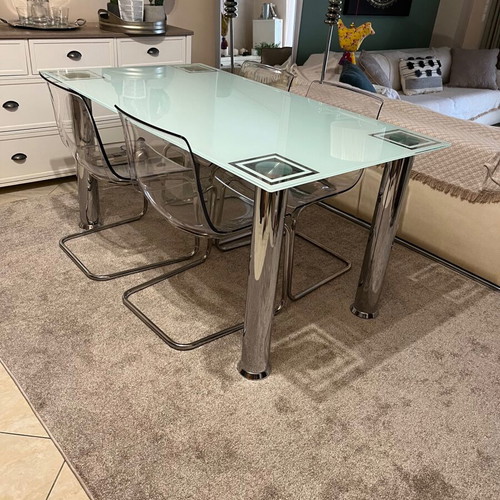 Glass kitchen table with four chairs like new
