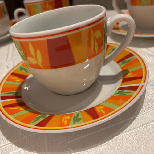 Vintage set of 6 cups and 6 saucers with bright colors, unused