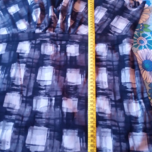 Women's blouse like new with unique design, size XL, black and white