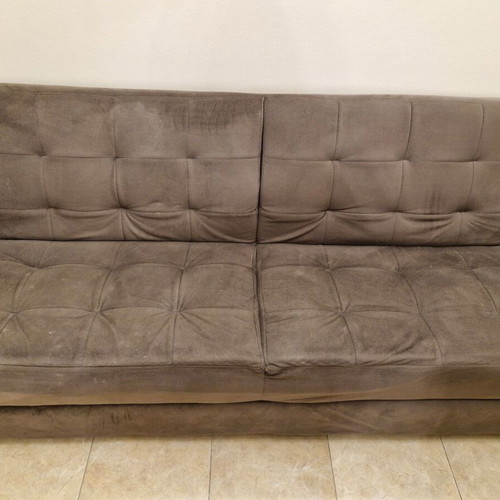 Sofa bed with pouf used, storage space