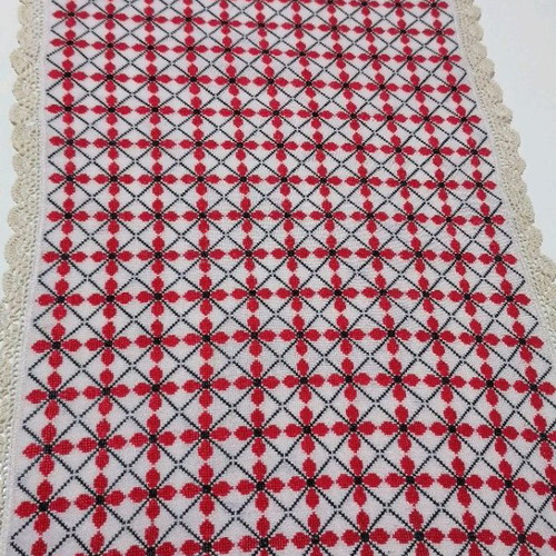 Large embroidered table runner used with handmade lace