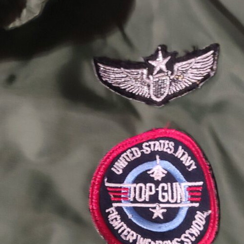 Flight jacket with embroidered patches like new, size 12