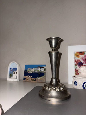 SilverPlated candlestick like new, silver tone, heavy with hallmark