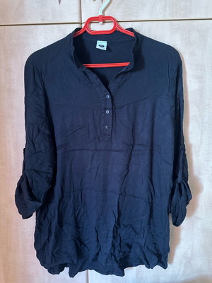 Women's shirt used black with long sleeve convertible to 3/4, sizes S/M