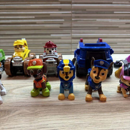 Paw Patrol figures and vehicles collection including Chase, Marshall, Rubble