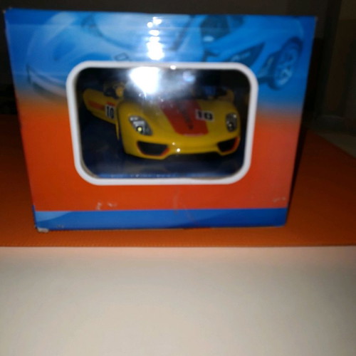 Ferrari yellow with remote control and opening doors new
