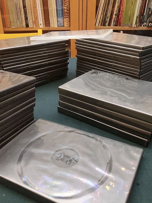 Plastic CD/DVD cases like new, single and double slim